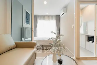 Modern apartment interior with cozy living room, stylish bedroom, and sleek kitchen design.