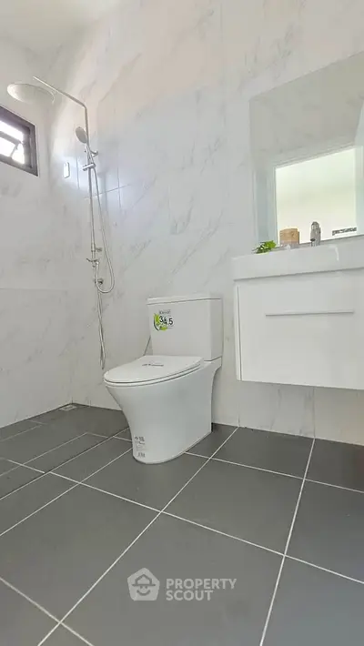 Modern bathroom with sleek fixtures and elegant tile design