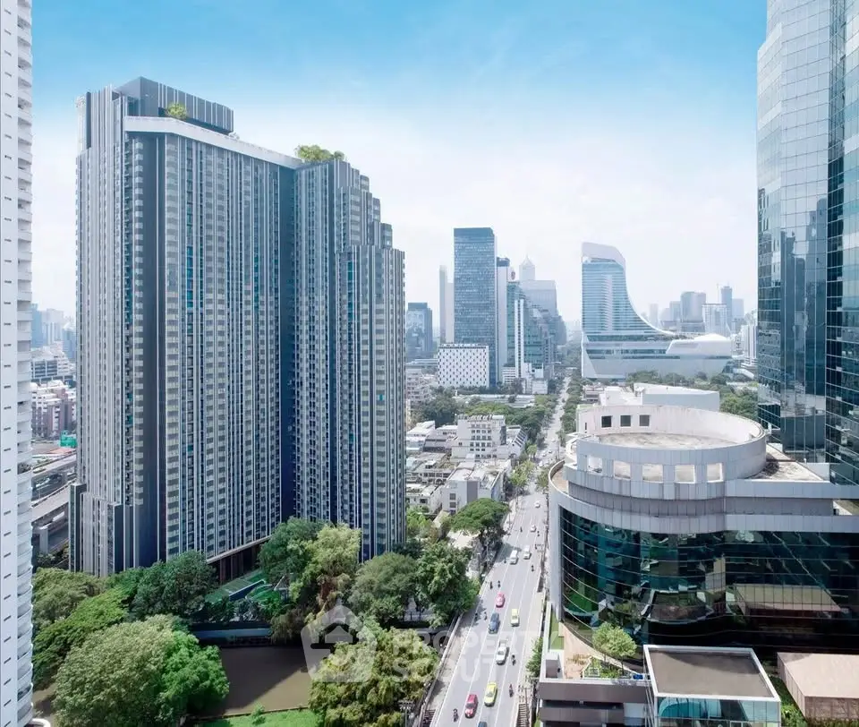 Stunning cityscape view with modern high-rise buildings and lush greenery, perfect for urban living.