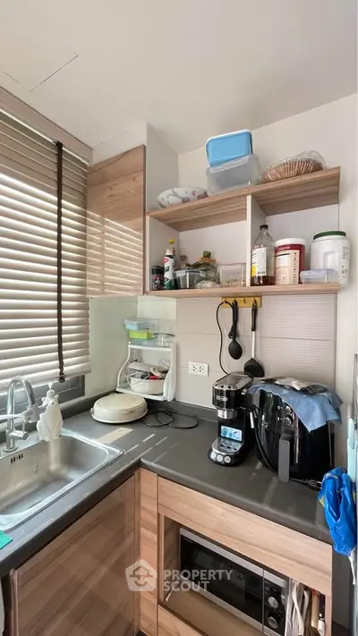 Modern kitchen with sleek appliances and ample storage space
