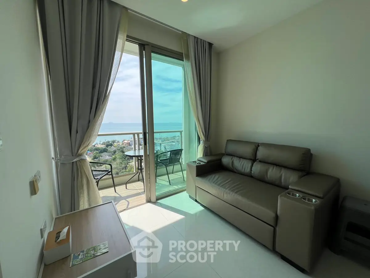Modern living room with ocean view and balcony access