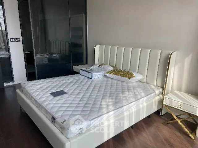 Modern bedroom with stylish bed and elegant decor