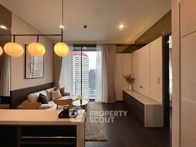 Modern living room with elegant decor and city view from large windows.