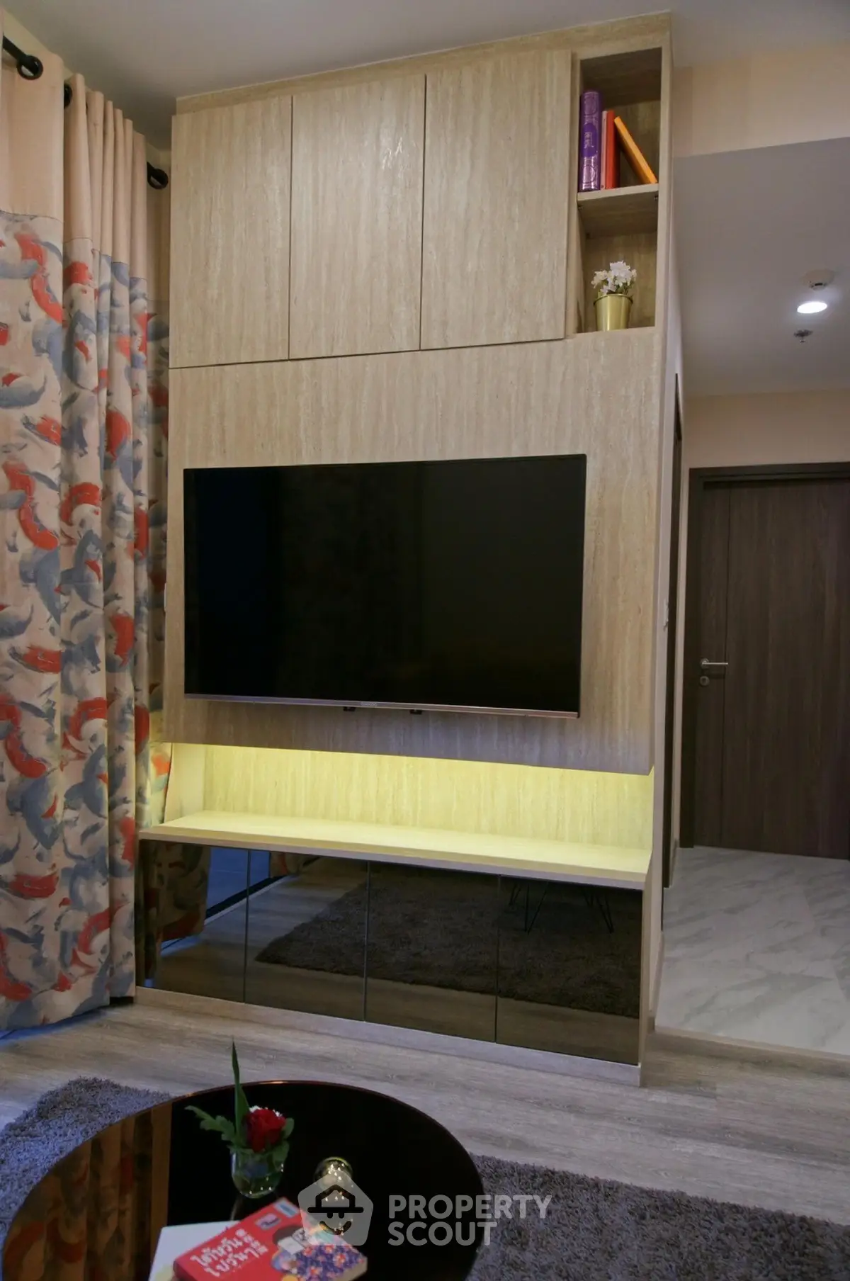 Modern living room with sleek TV unit and stylish decor