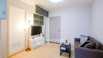 Modern living room with cozy sofa and stylish decor in a bright apartment