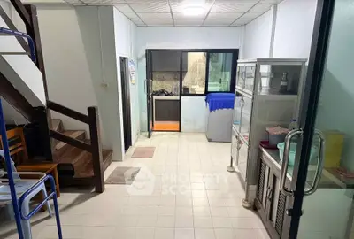 Cozy interior with staircase and kitchenette in a compact living space