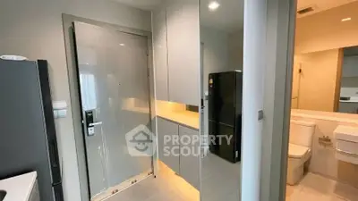 Modern apartment interior with sleek kitchen and bathroom design