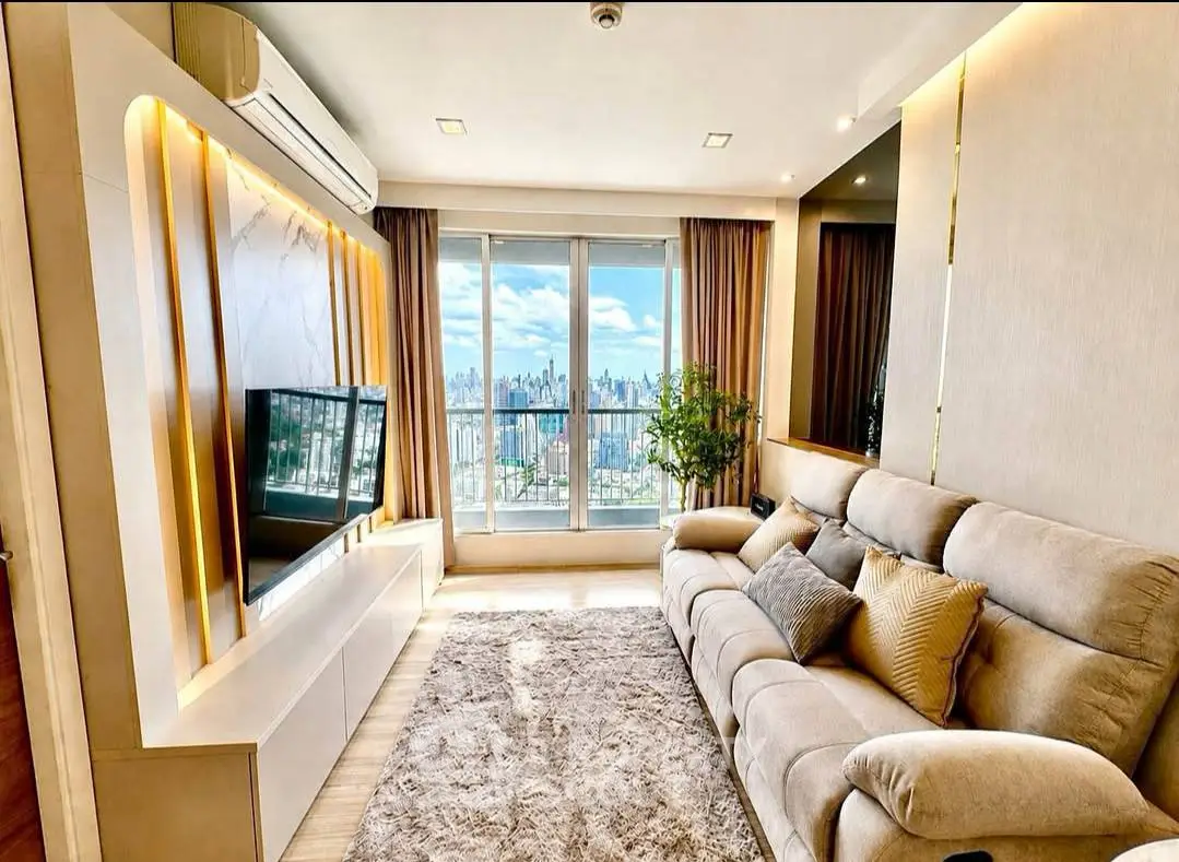 Luxurious living room with stunning city view and modern decor