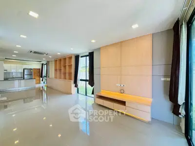 Spacious modern living room with open layout and large windows
