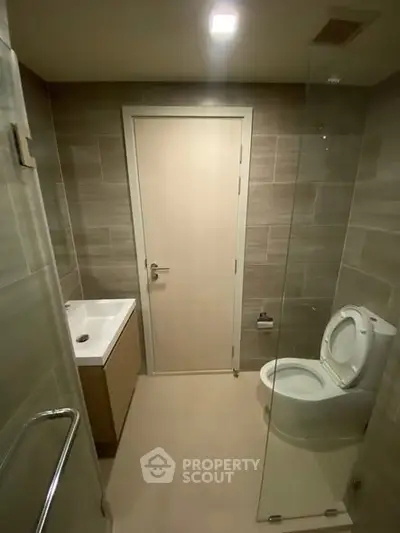 Modern bathroom with sleek design and glass shower enclosure