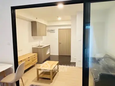 Modern studio apartment with open layout and stylish furnishings.