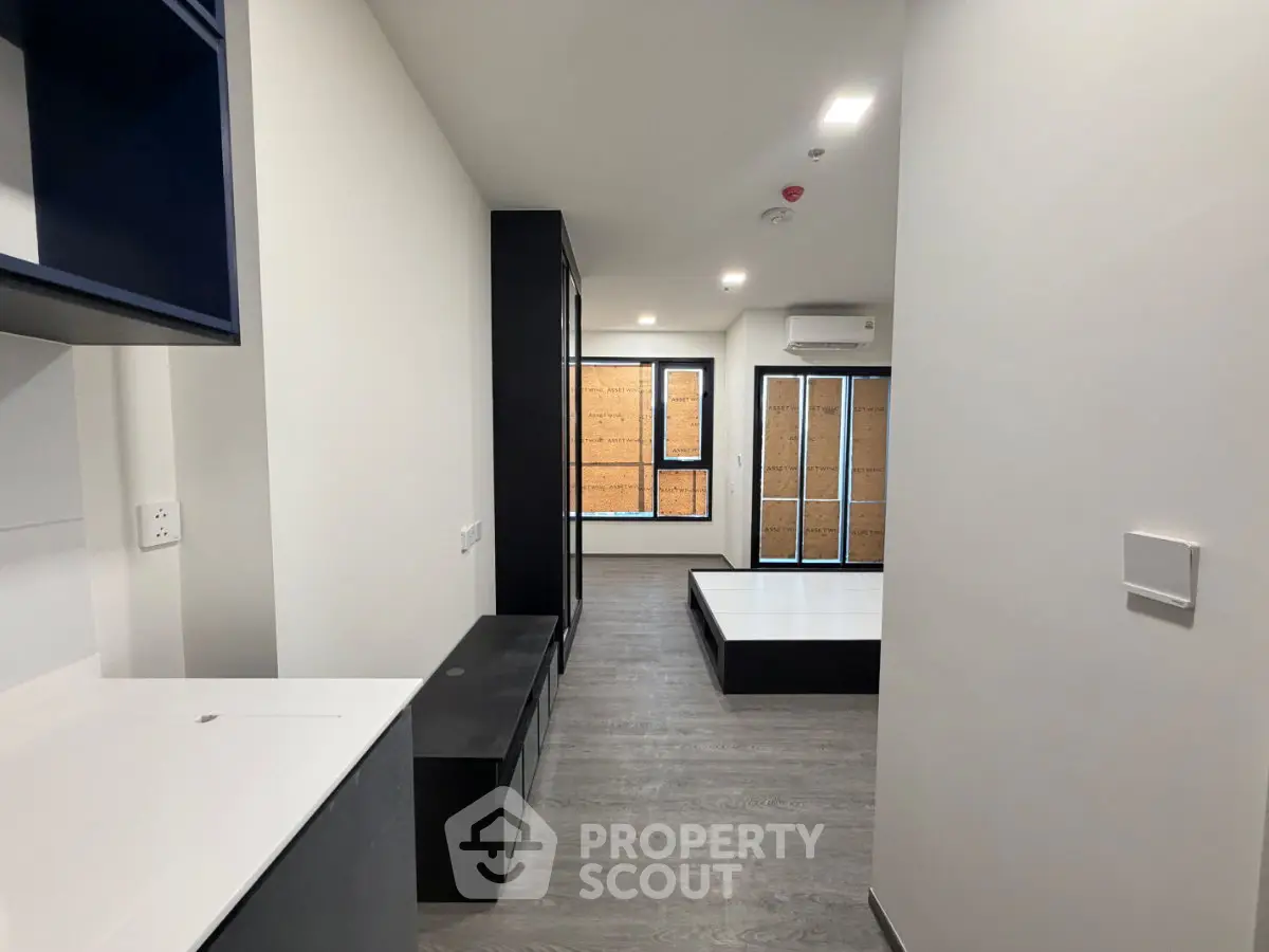 Modern minimalist apartment interior with sleek design and natural light