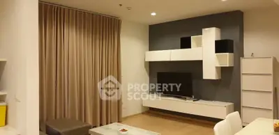 Modern living room with sleek TV unit and stylish decor