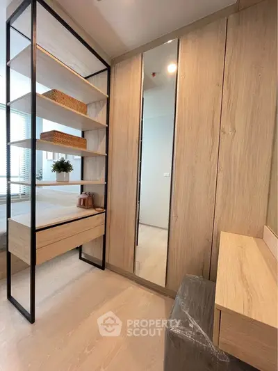 Modern bedroom with stylish wooden wardrobe and sleek design
