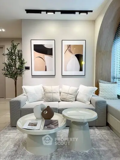 Stylish modern living room with abstract art and cozy seating