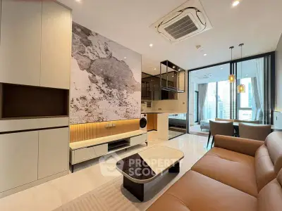 Luxurious modern living room with stylish decor and open kitchen layout in high-rise apartment.