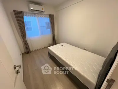Cozy bedroom with minimalist design and natural light