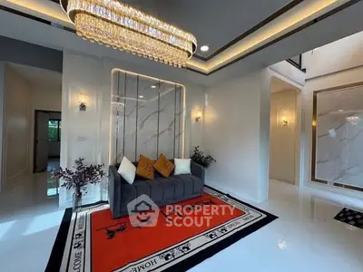 Luxurious living room with elegant chandelier and modern decor