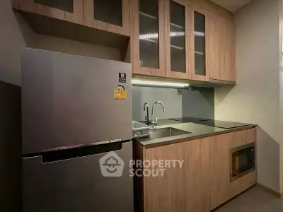 Modern kitchen with sleek cabinetry and stainless steel appliances