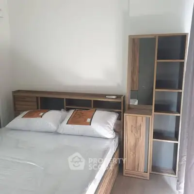 Modern bedroom with stylish wooden furniture and cozy ambiance