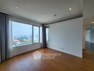 Spacious corner unit with stunning city view and hardwood floors