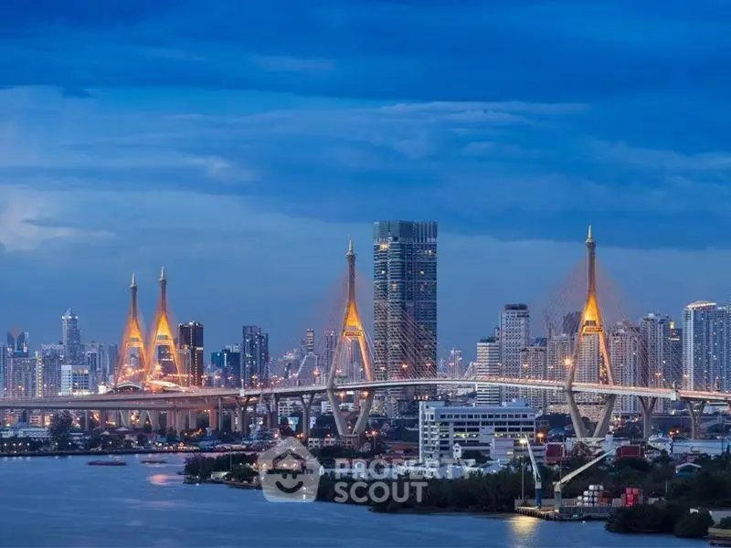 Stunning cityscape view with iconic bridge and skyline at dusk, perfect for urban living enthusiasts.
