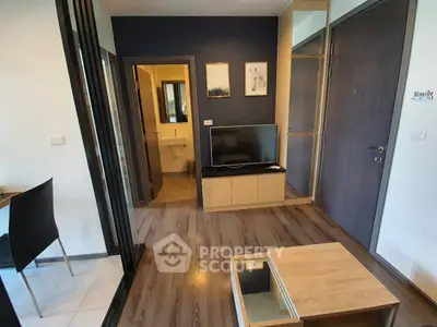 Modern living room with sleek decor and wooden flooring