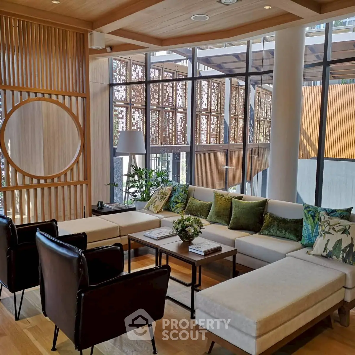 Luxurious modern living room with elegant decor and large windows