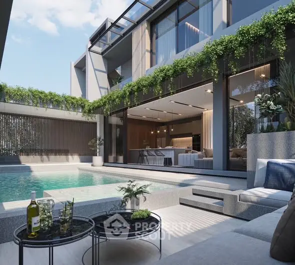 Luxurious modern home with pool and open living space, perfect for entertaining.