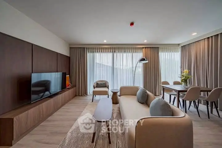 Spacious modern living room with elegant decor and natural light