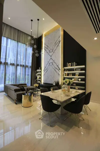 Luxurious modern living room with high ceilings and elegant decor