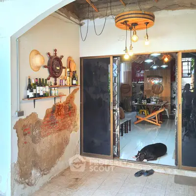 Charming rustic interior with exposed brick and cozy decor, featuring a unique nautical theme and inviting ambiance.