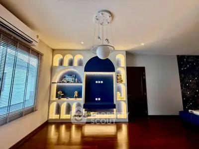 Modern living room with unique built-in shelving and ambient lighting