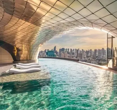 Luxurious rooftop infinity pool with stunning city skyline view
