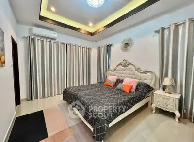 Luxurious bedroom with elegant decor and modern lighting
