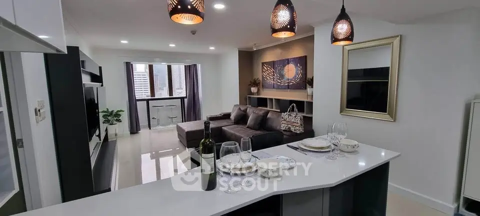 Modern open-layout living room with stylish decor and city view