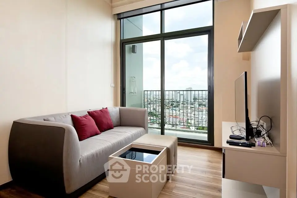 Modern living room with city view and stylish furniture