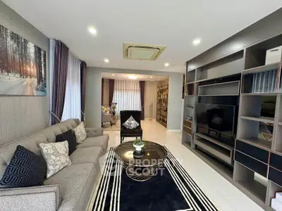 Modern living room with stylish decor and built-in entertainment center