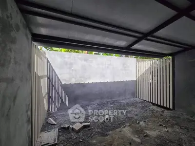 Spacious unfinished garage with modern design potential