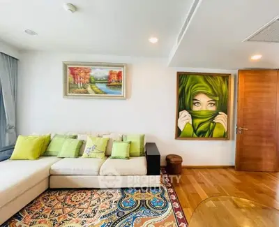 Stylish living room with modern art and cozy seating area