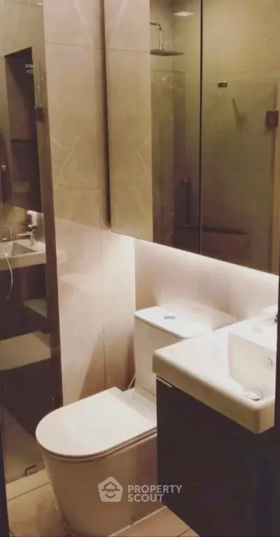 Modern bathroom with sleek fixtures and ambient lighting