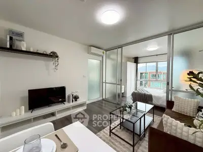 Modern open-plan living room with sleek design and natural light