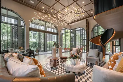 Luxurious living room with elegant decor and stunning garden view in modern apartment
