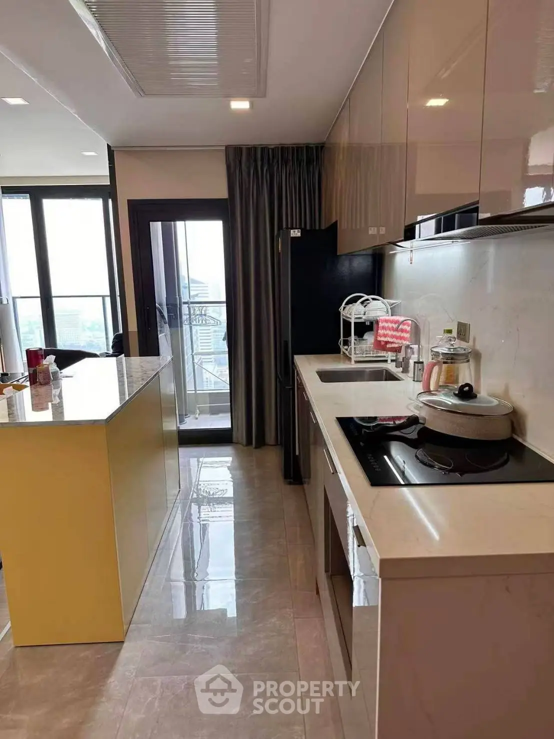 Modern kitchen with sleek design and open layout, featuring high-end appliances and ample natural light.