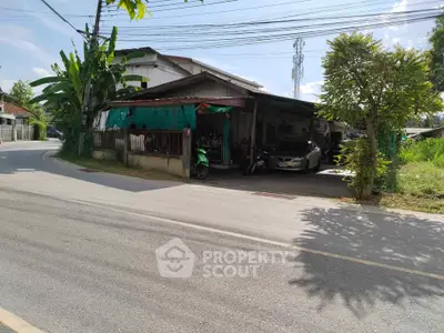 Charming suburban house with lush greenery and ample parking space