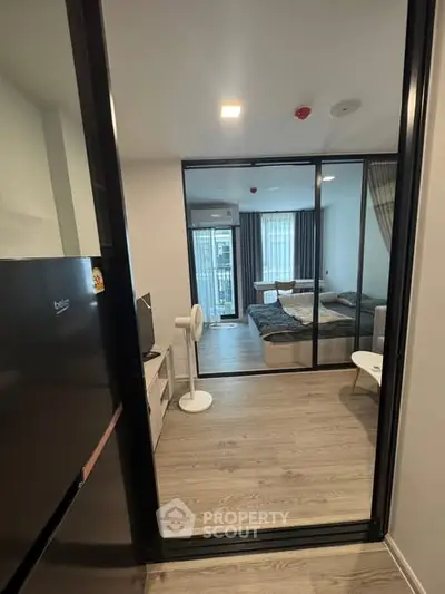 Modern apartment interior with sleek design and cozy bedroom view