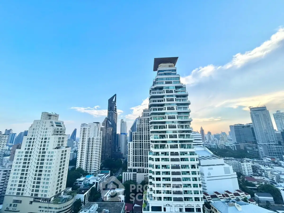 Stunning cityscape view showcasing modern high-rise buildings at sunset.