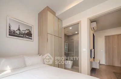 Modern bedroom with ensuite bathroom and stylish decor