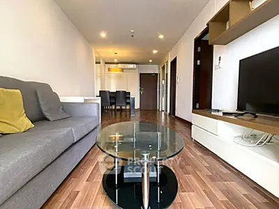 Spacious modern living room with stylish furniture and open layout