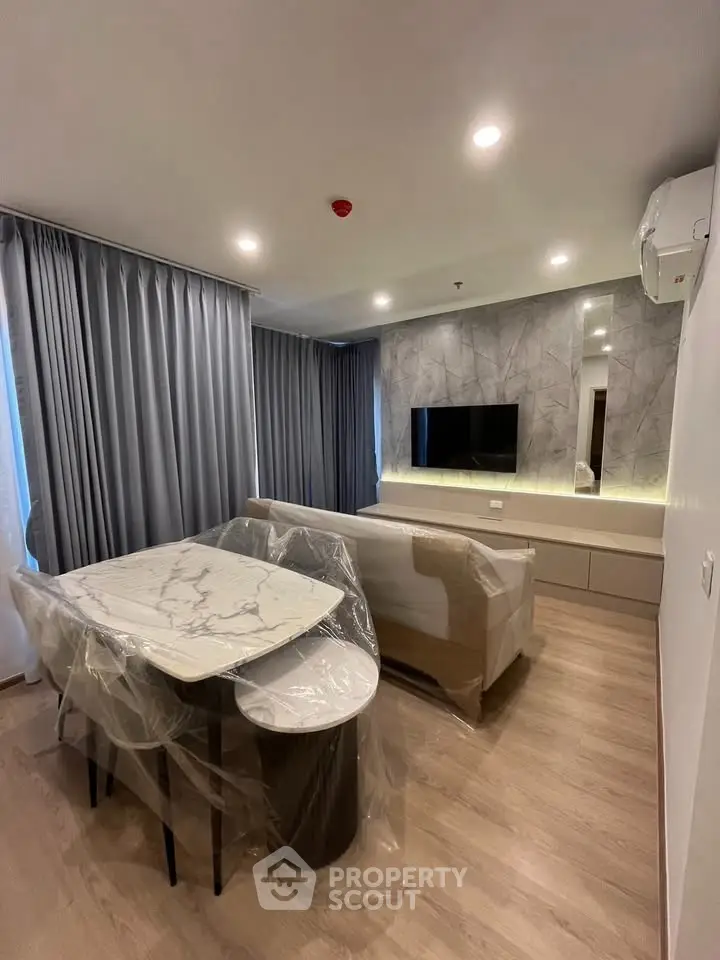 Modern living room with elegant marble dining table and stylish decor